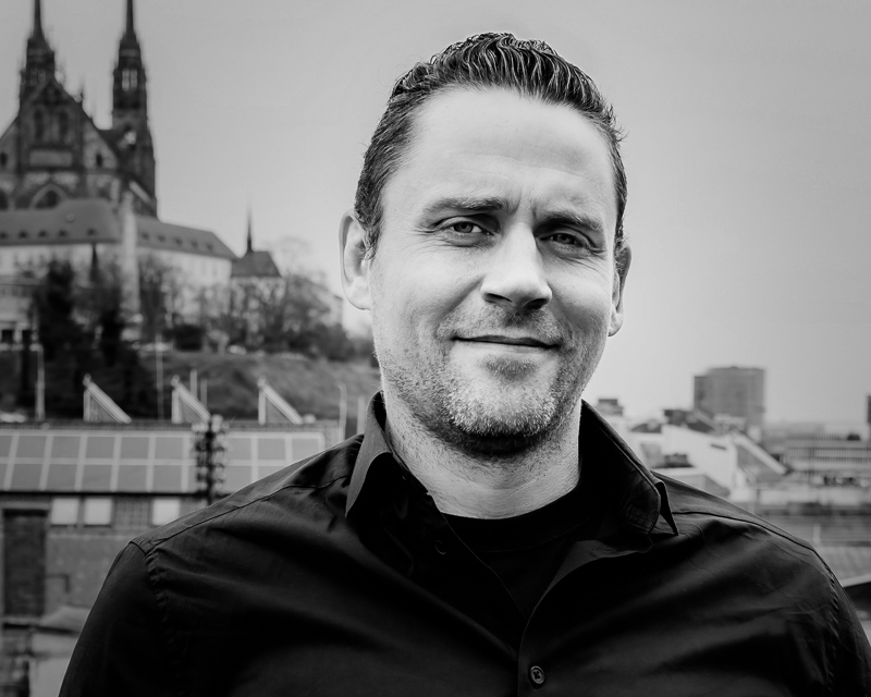Portrait photo of Dr. Adam Williamson